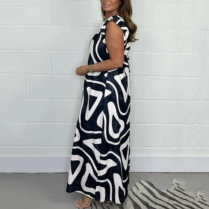 Nova | Women's Abstract Print V-Neck Ruffle Sleeve Wide Leg Jumpsuit - Image 6